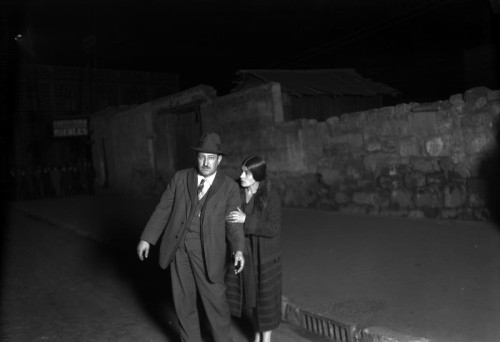 Police archive photo, with Tina Modotti, recreating possible version of Mella assassination.