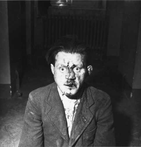 Lee Miller, photography. (Guard at Buchenwald, 1945, who had tried to escape).