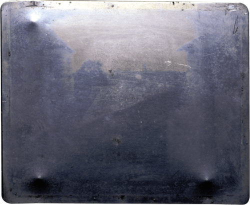 First known photograph by Nicéphore Niépce, 1827. (Heliography. 8 hour exposure. WIndow at Le Gras).