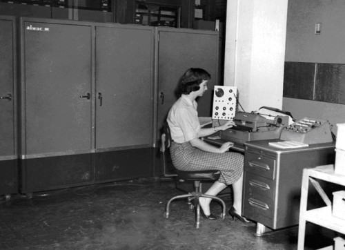 ALWAC III, 1959. Irma Lewis,  NWRC programmer at console.